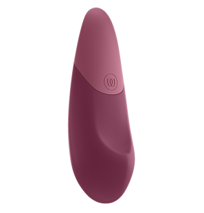 Womanizer lying-down vibrator in dusky pink