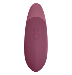 Womanizer lying-down vibrator in dusky pink