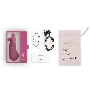 Womanizer lying-down vibrator in dusky pink