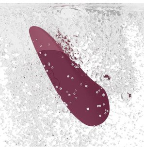 Womanizer lying-down vibrator in dusky pink