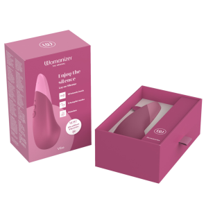 Womanizer lying-down vibrator in dusky pink