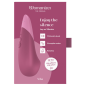 Womanizer lying-down vibrator in dusky pink